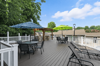 The greens at hollymead poolside lounge & grilling area